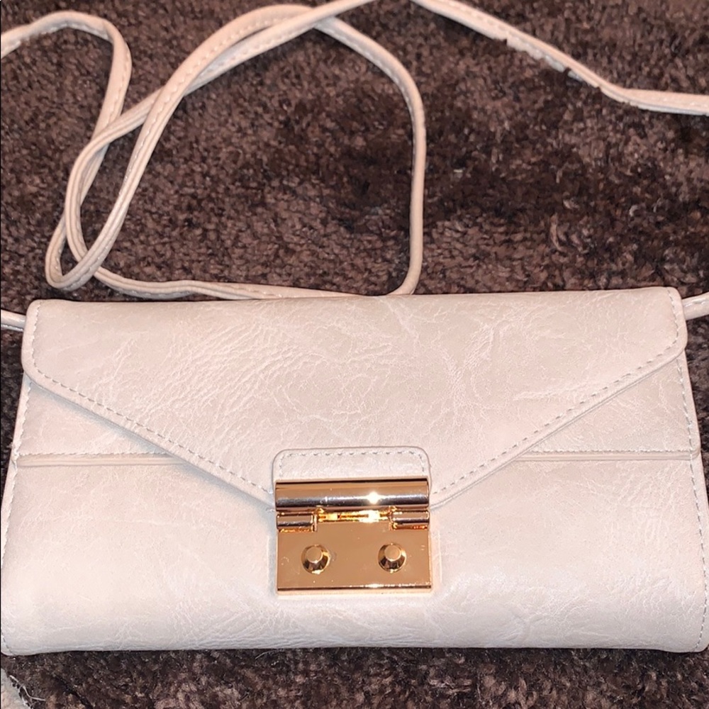 NWT Vegan Leather Embossed Expandable Clutch